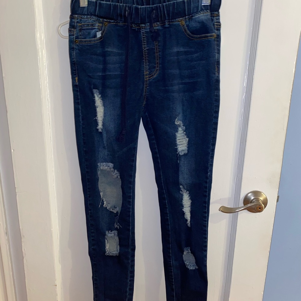 Ripped blue jeans